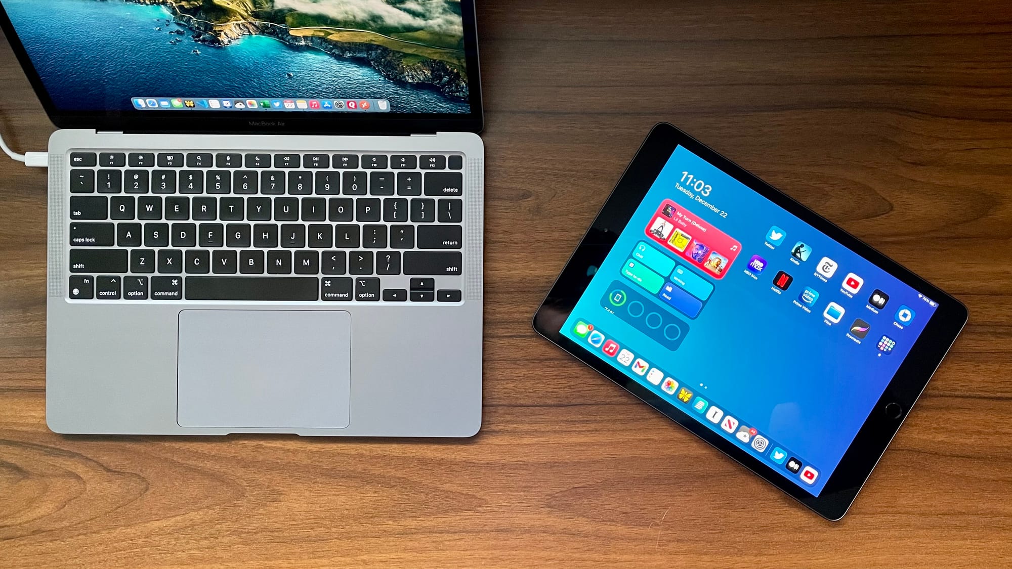 MacBook Pro and iPad is a great setup for many. Both on a wooden table.